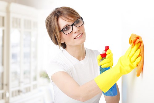 Professional move out cleaning of a bright kitchen interior